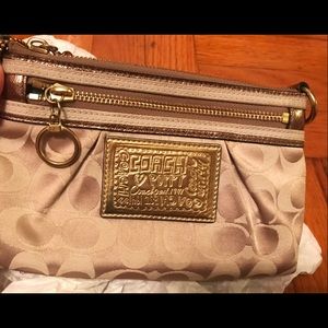 Coach gold wristlet